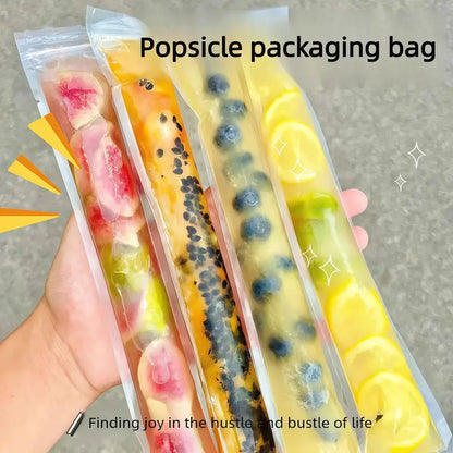 Colorful fruit popsicles in disposable bags on ice plate — lifestyle shot